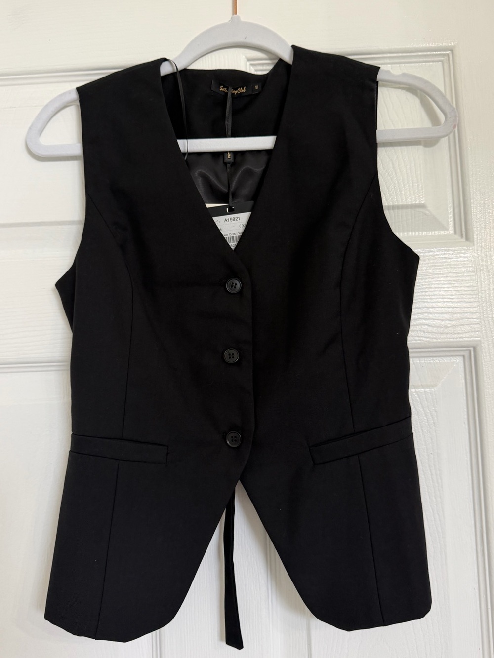 NWT Black sleeveless vest with open back Size XS